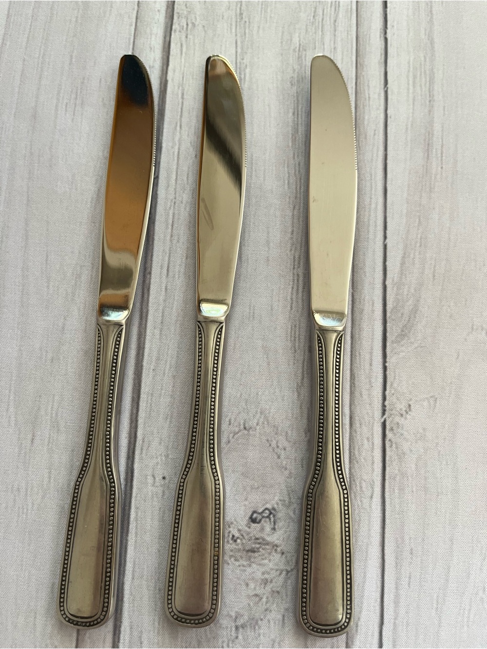 One set of 3 vintage Salem 1776 stainless steel beaded edge butter knives.